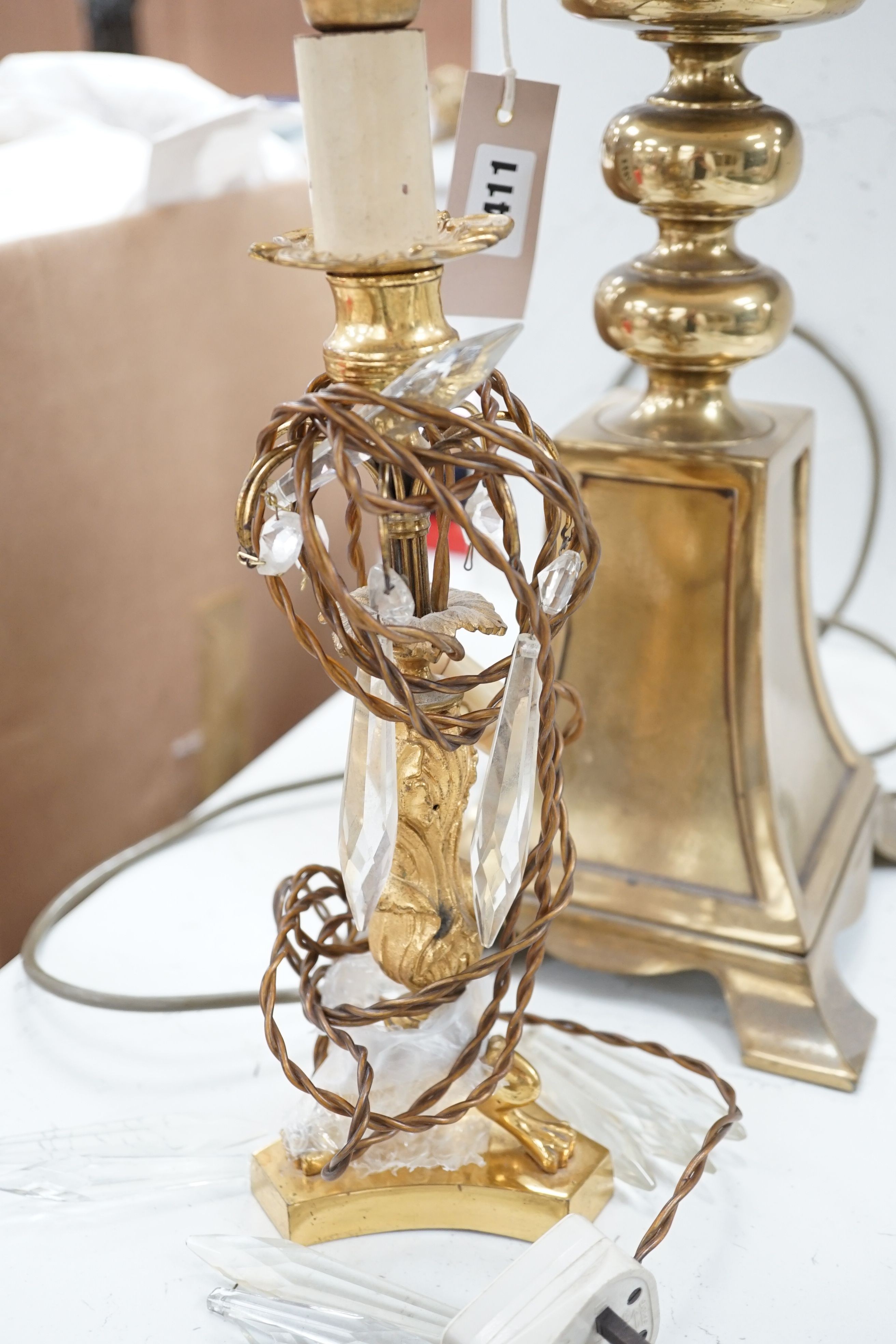A large brass table lamp and a gilt metal and lustre hung table lamp, table lamp 50 cms high not including light fitting.